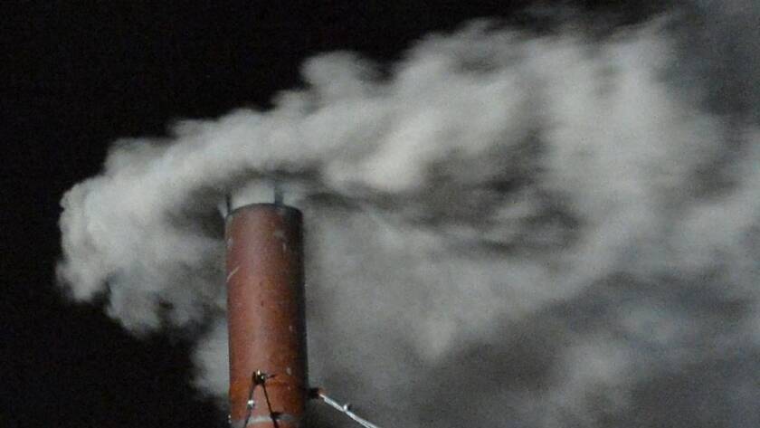 White smoke billows from the chimney of the Sistine Chapel at the election of the late Pope Francis on March 13, 2013 (AFP or licensors)